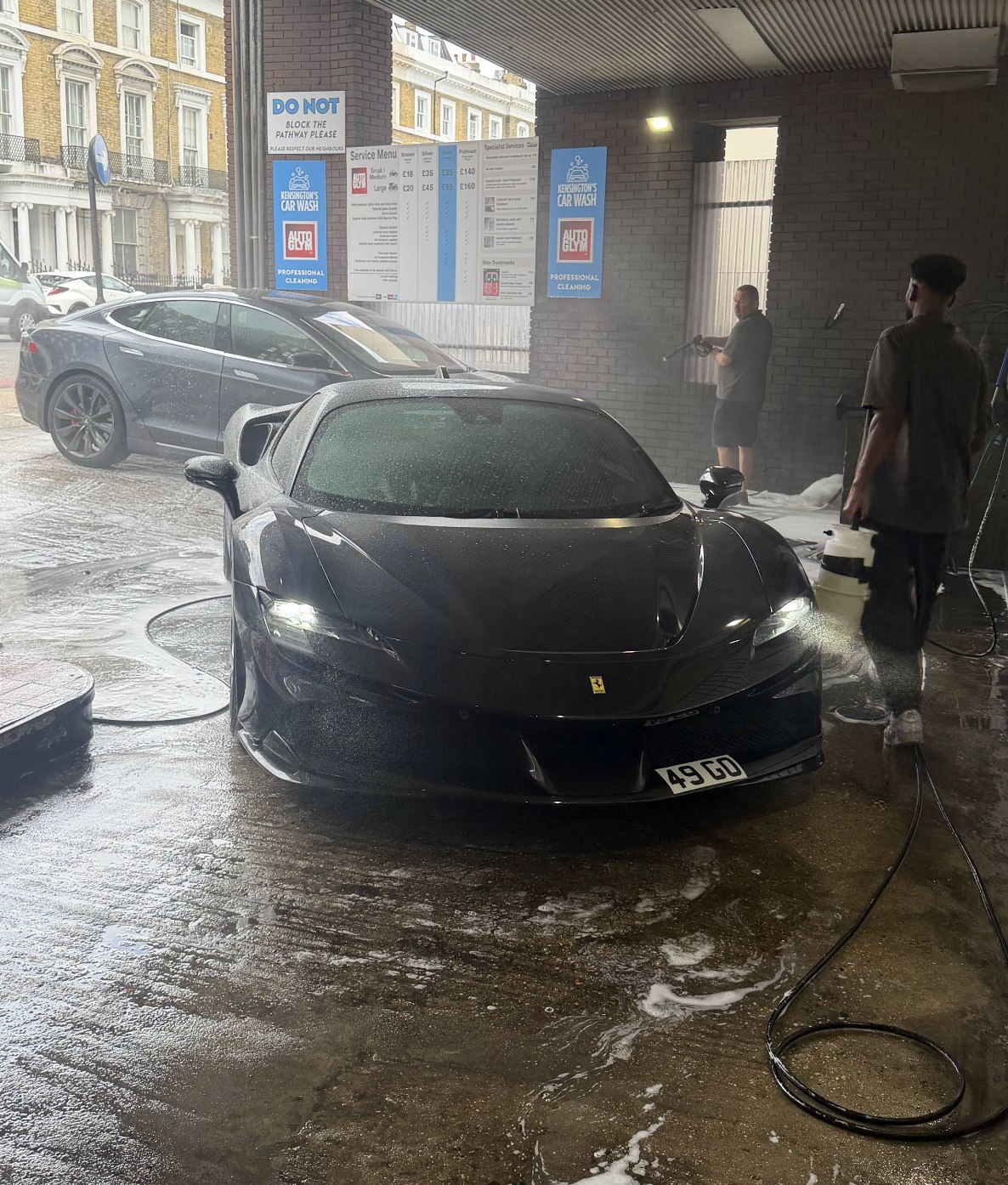 Ferrari SF90: buried in snow foam at Kensington's Car Wash