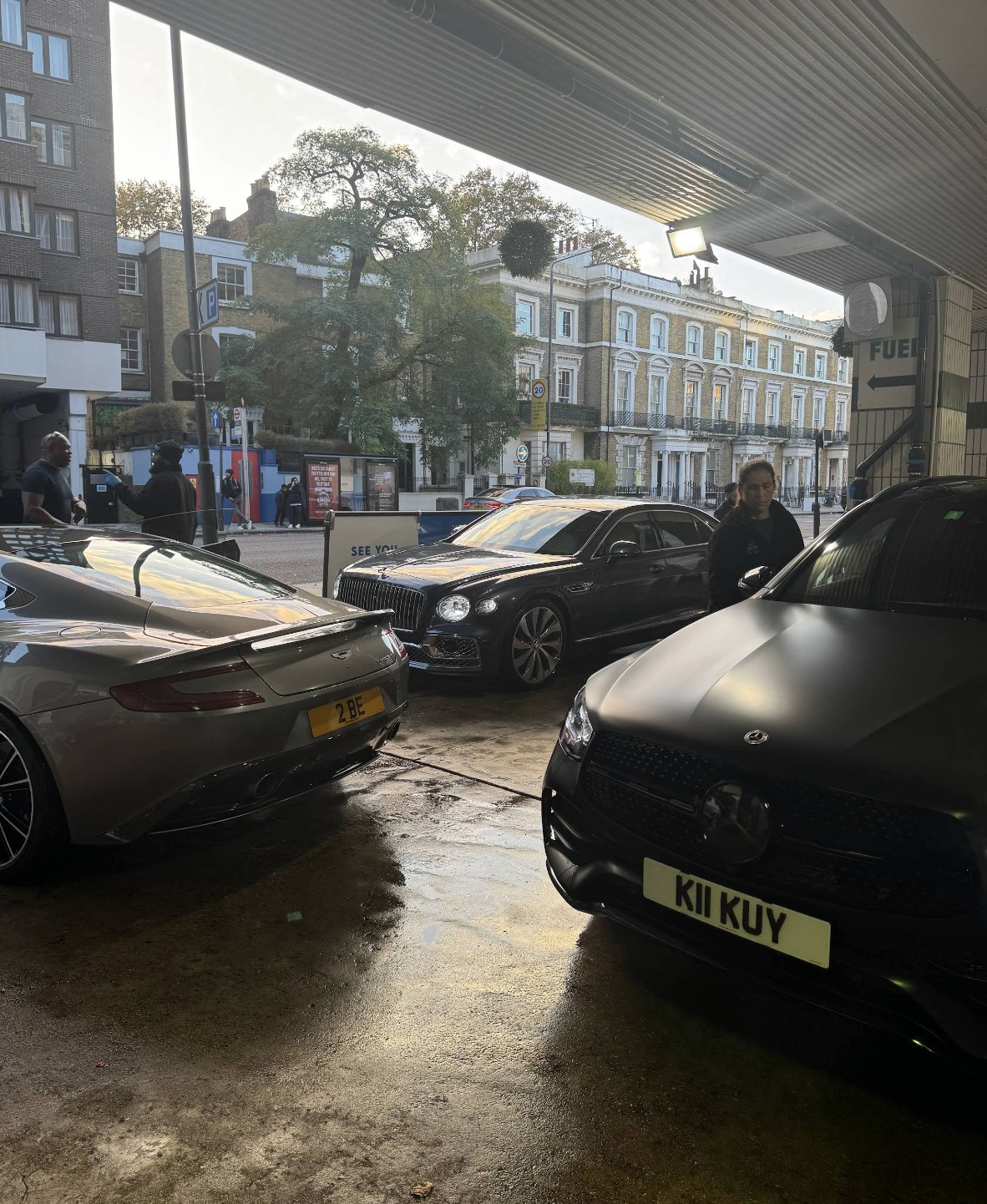 Aston Martin and Bentley: on Holland Road at Kensington's Car Wash