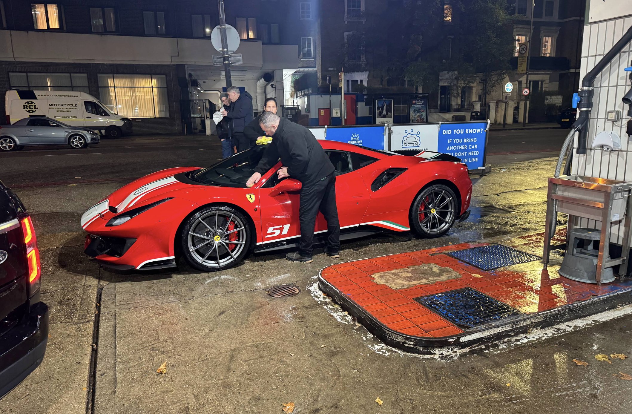 Ferrari F8: getting the crew's attention at Kensington's Car Wash